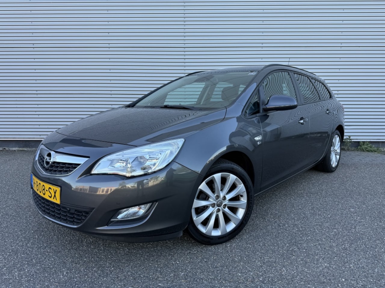 Opel Astra Sports Tourer - 1.4 Turbo Sport Trekhaak 17" LMT Cuise NW Motor - AutoWereld.nl
