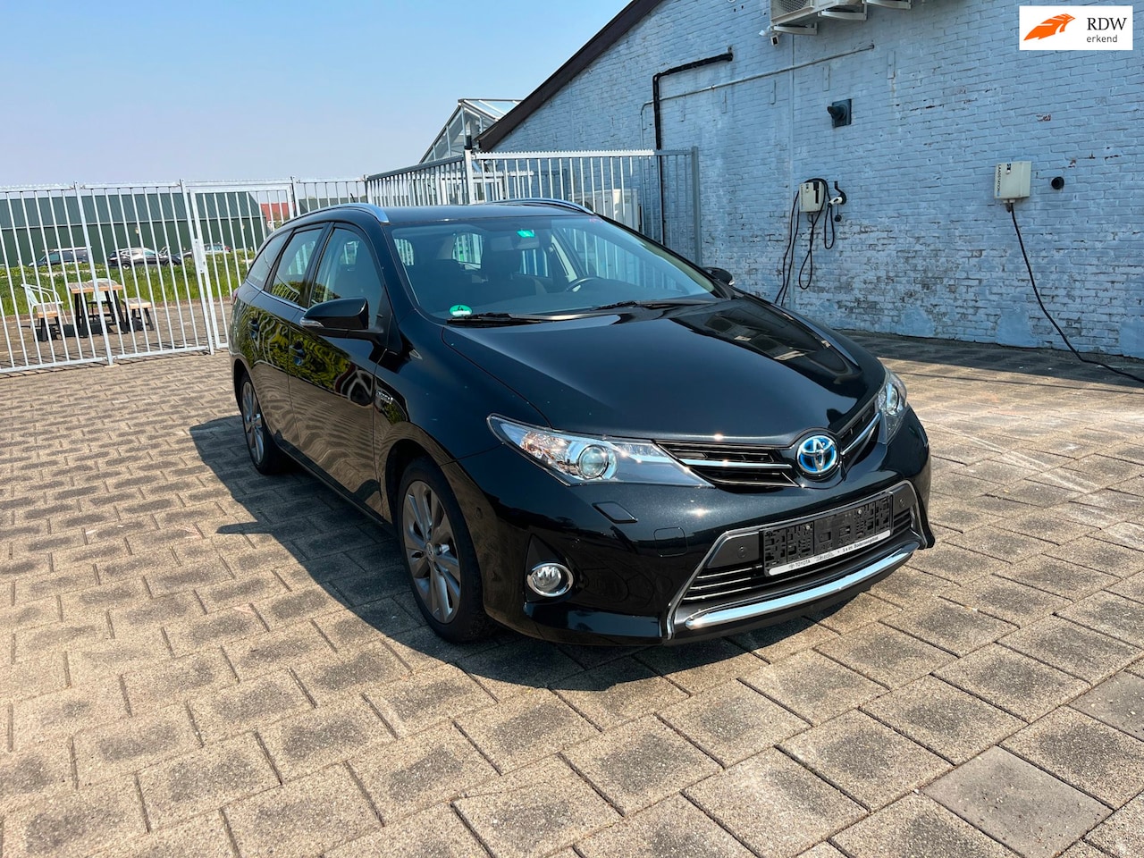 Toyota Auris Touring Sports - 1.8 Hybrid Executive ZGAN - AutoWereld.nl