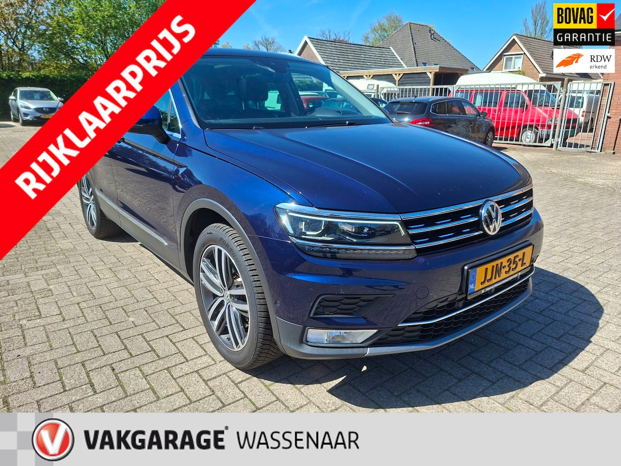 Volkswagen Tiguan - 2.0 TSI 4Motion Highline dsg trekh pano - AutoWereld.nl