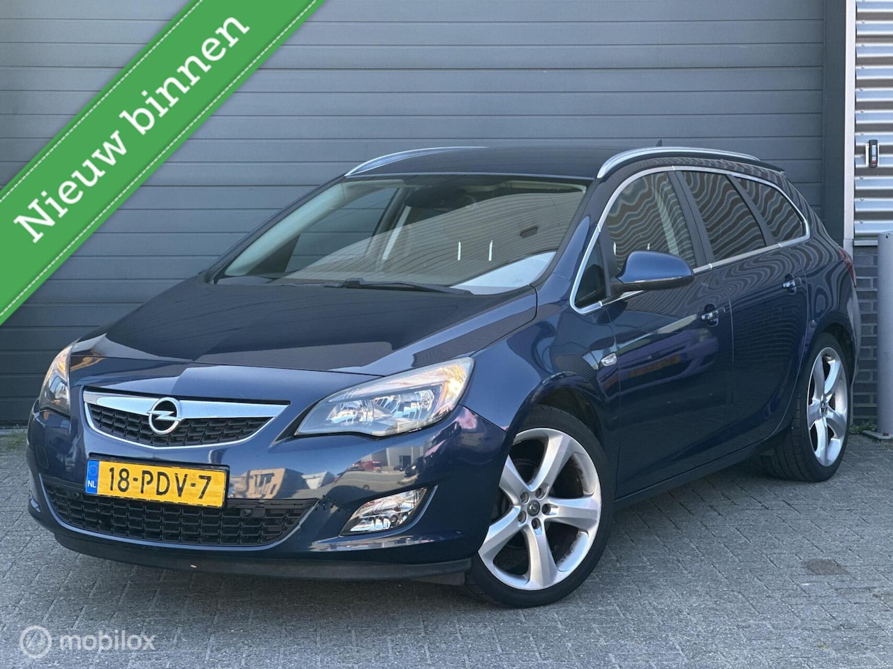 Opel Astra Sports Tourer - 1.4 Turbo Sport | Airco | - AutoWereld.nl