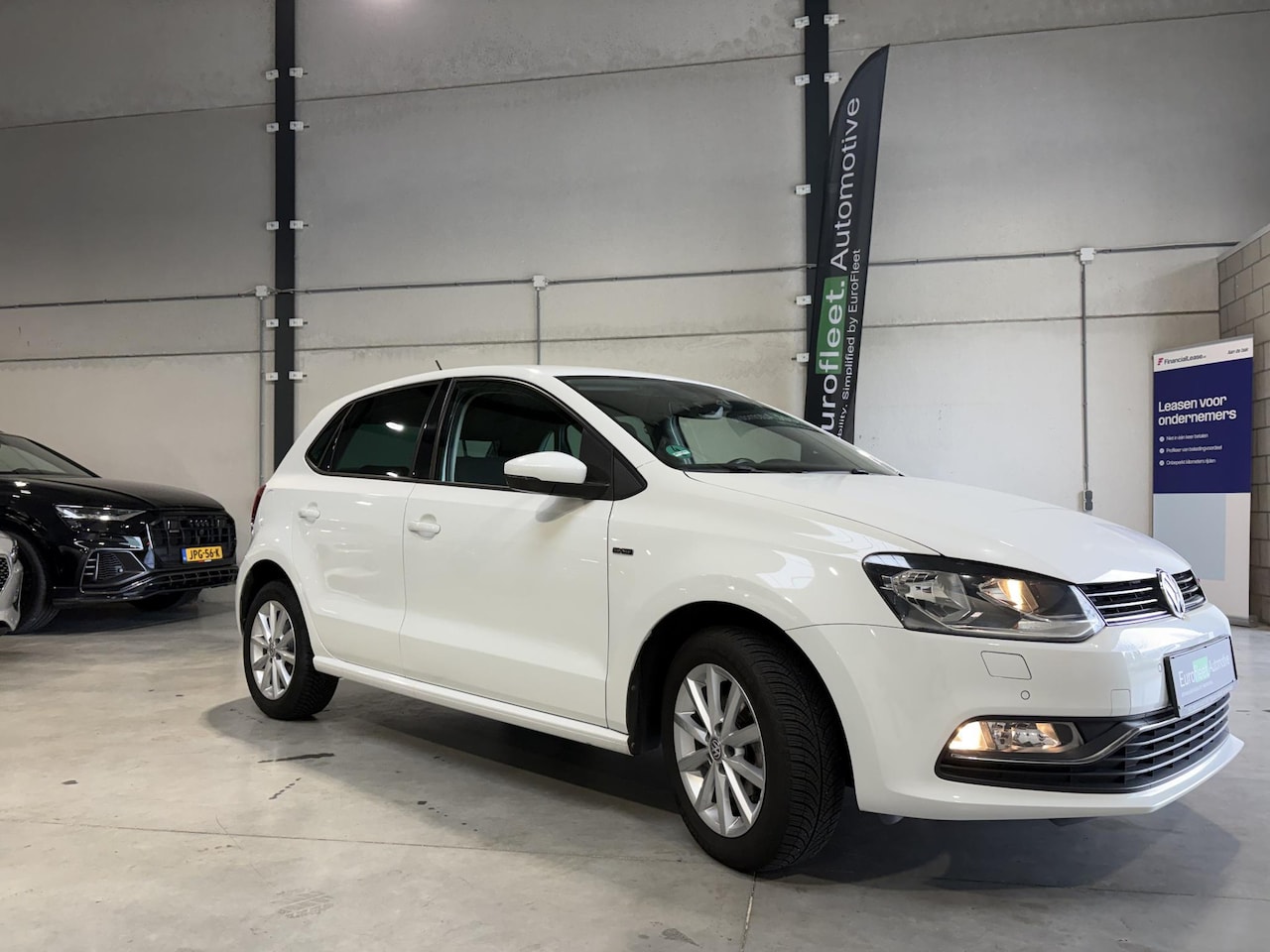 Volkswagen Polo - 1.0 MPI Lounge | Stoelverw. | climate control | Lage kilometerstand | nieuwstaat