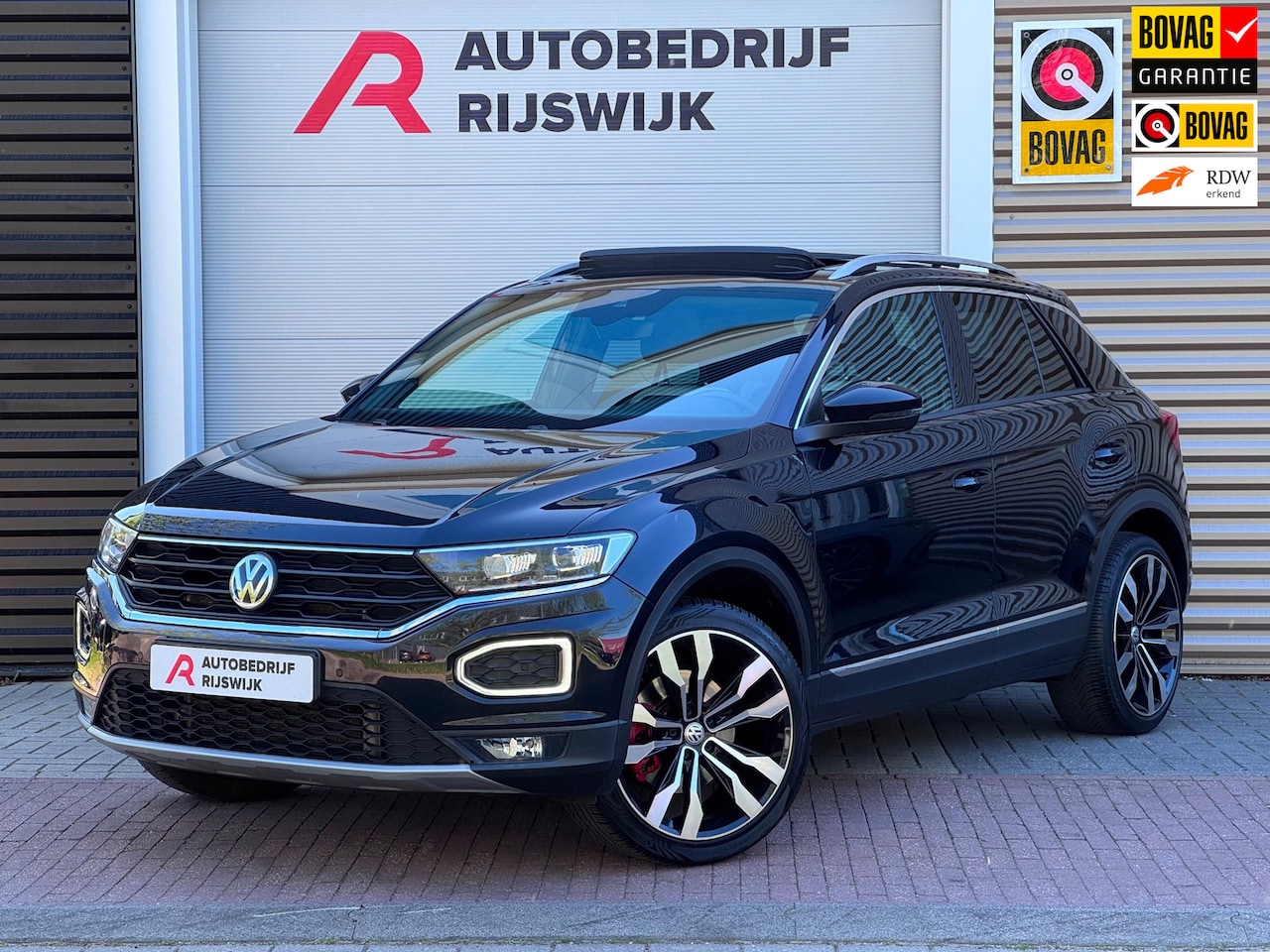 Volkswagen T-Roc - 2.0 TSI 4Motion Sport Business R Pano/Virtual - AutoWereld.nl