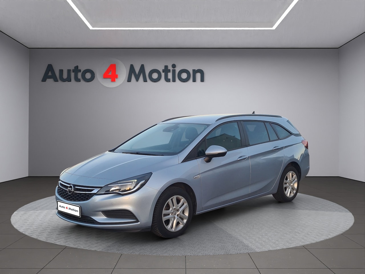 Opel Astra Sports Tourer - 1.4 Turbo Cosmo Met ECC / NAVIG / CAMERA / LED - AutoWereld.nl