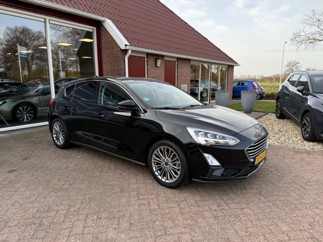 Ford Focus - 1.0 TITANIUM BUSINESS Origi NL/Winter Pakket/Cruise Control - AutoWereld.nl