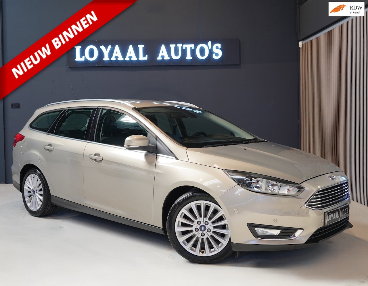Ford Focus Wagon - 1.0 Titanium | NAVI | AIRCO | CRUISE | TREKHAAK | PDC | NAP | APK. - AutoWereld.nl