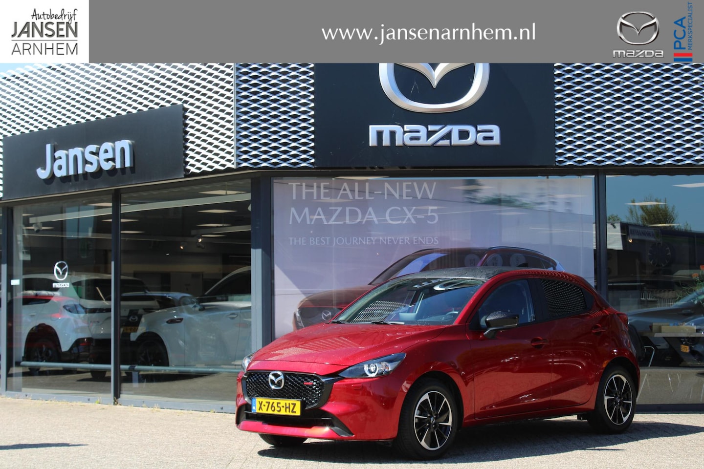 Mazda 2 - 1.5 e-SkyActiv-G 90 Homura Aka 1.5 e-SkyActiv-G 90 Homura Aka , Apple Carplay, LMV 16 Inch, Zwart Dak, Camera, PDC, Clima - AutoWereld.nl