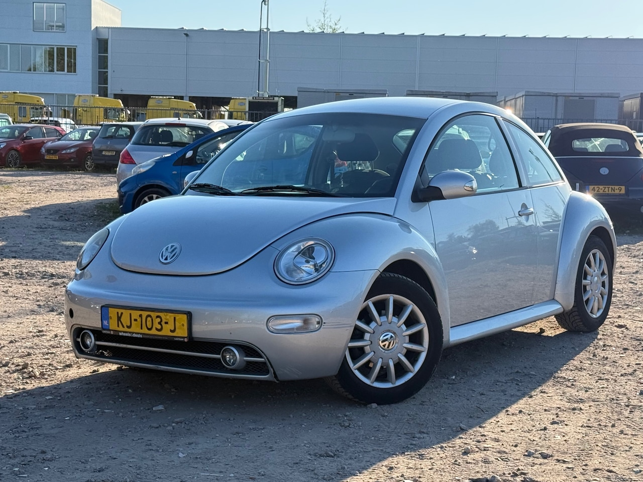Volkswagen New Beetle Cabriolet - 1.4/INRUILKNALLER - AutoWereld.nl