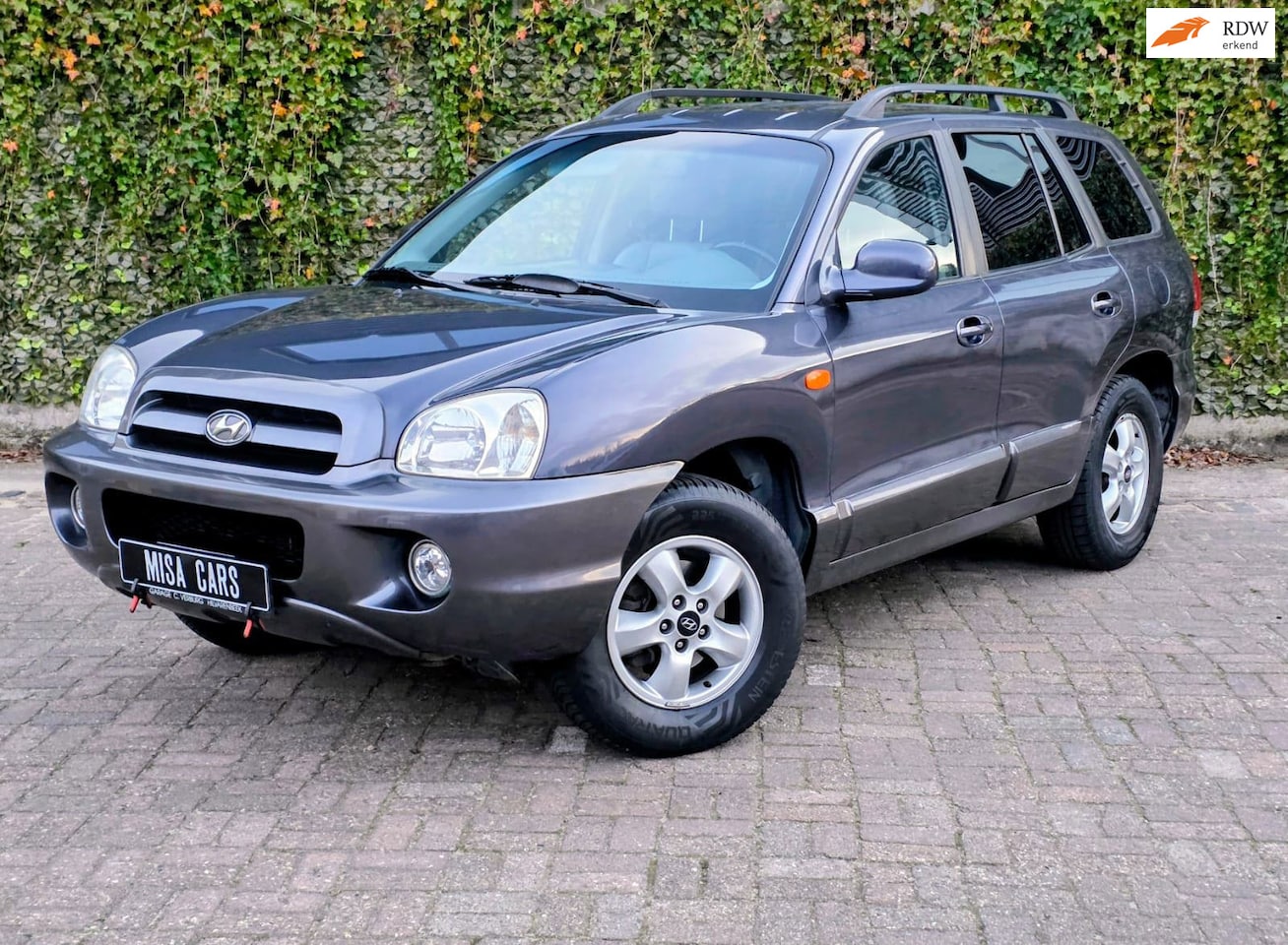 Hyundai Santa Fe - 2.7i V6 4WD Style Automaat Trekhaak Airco NW Distributieriem - AutoWereld.nl