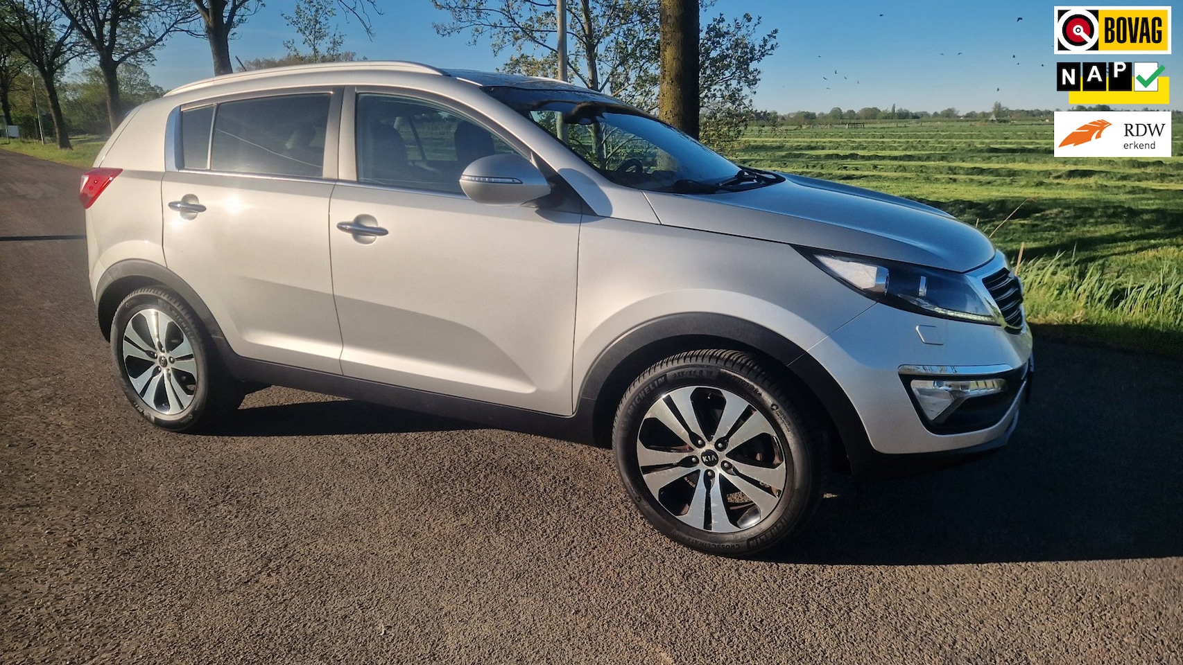 Kia Sportage - 2.0 X-clusive 2.0 X-clusive, trekhaak - AutoWereld.nl