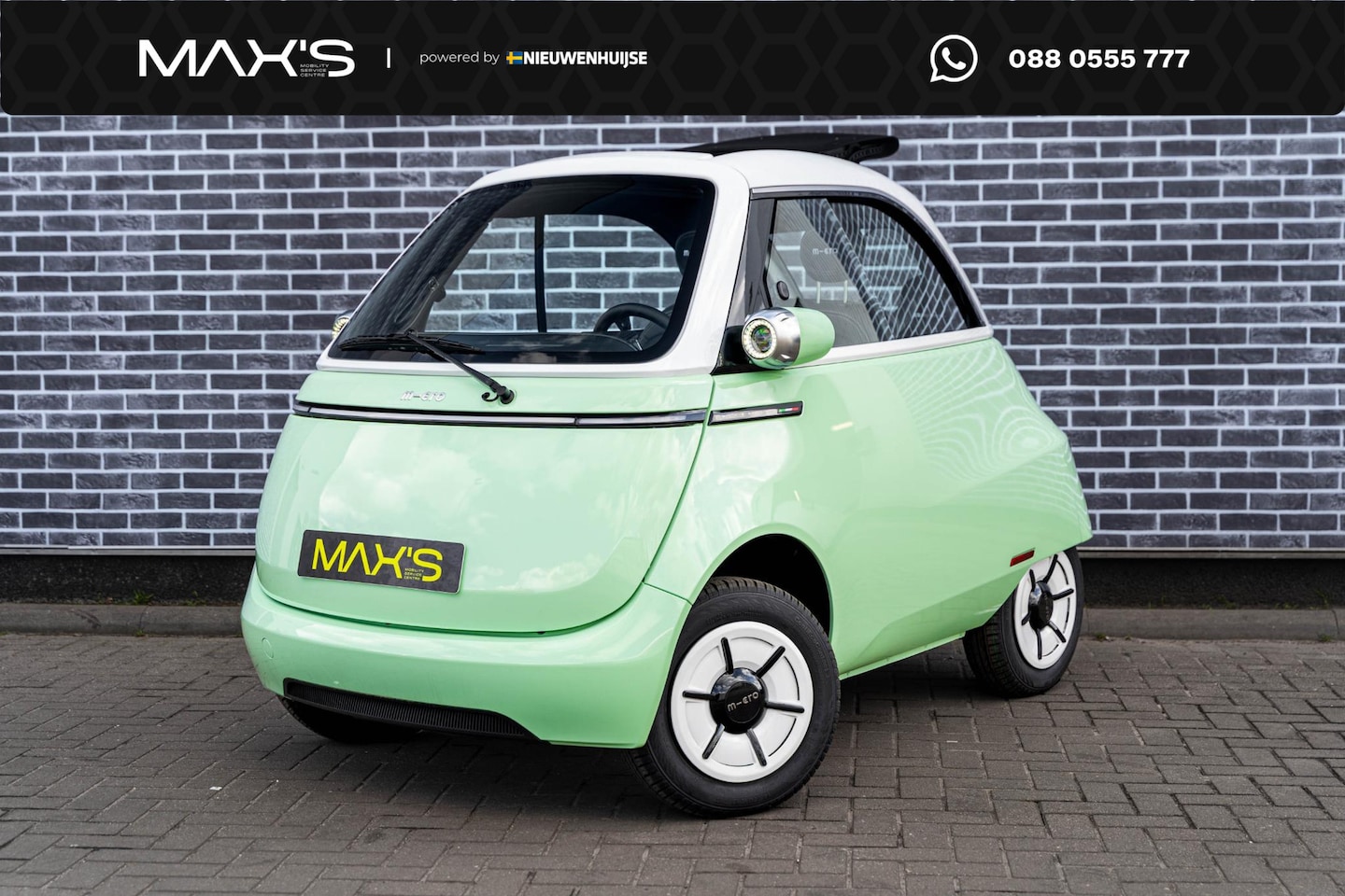 Micro Microlino - L7 Paris Mint 12,5 kWh | Schuifdak | 177km Rijbereik | Bluetooth | Led | USB | Achteruitve - AutoWereld.nl