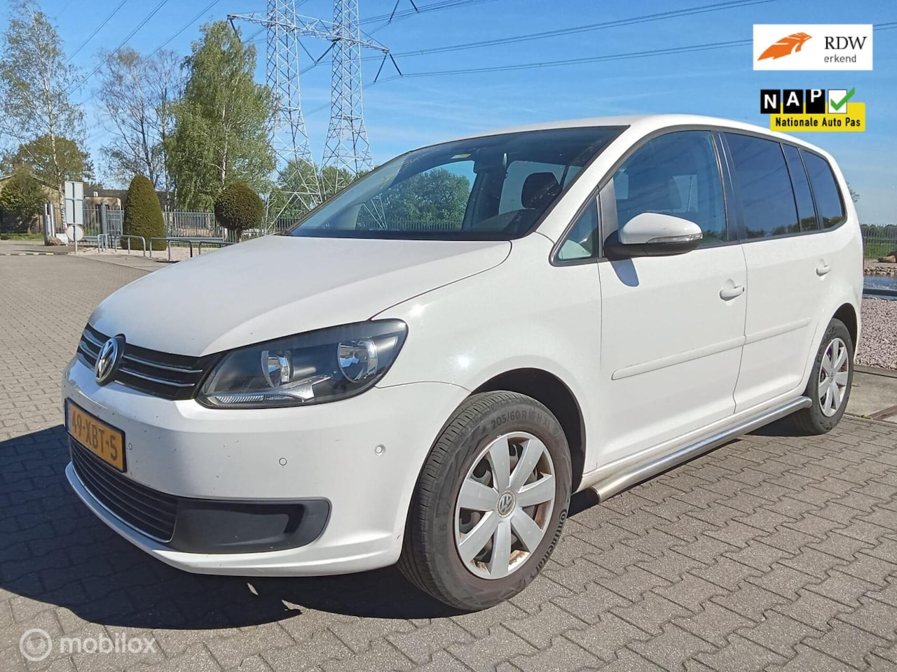 Volkswagen Touran - 2.0 TDI Comfortline BlueMotion/automaat/cruise/navi - AutoWereld.nl