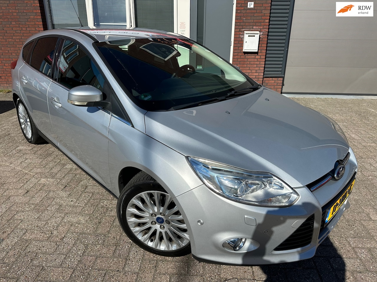 Ford Focus - 1.0 EcoBoost Titanium / Navi / PDC / Clima / LM / NAP - AutoWereld.nl