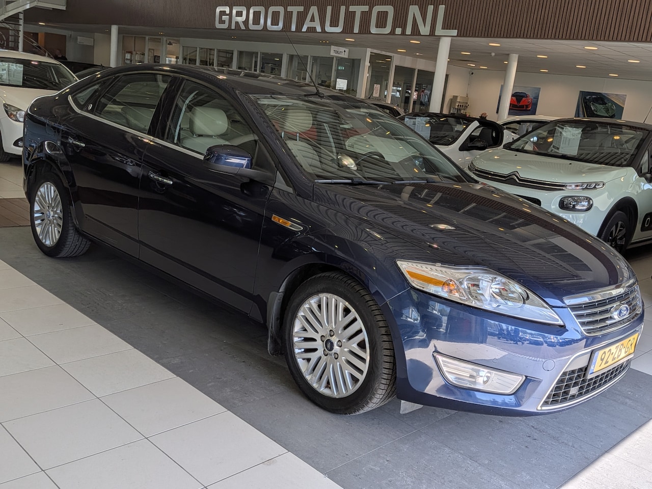 Ford Mondeo - 2.5-20V Ghia Airco, Cruise Control, Leder, Stuurbekrachtiging - AutoWereld.nl