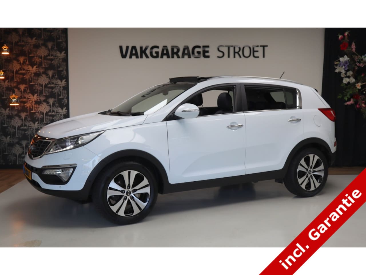 Kia Sportage - 2.0 Super P.| leer | navi | cam | climate | pano | oh.bkje - AutoWereld.nl