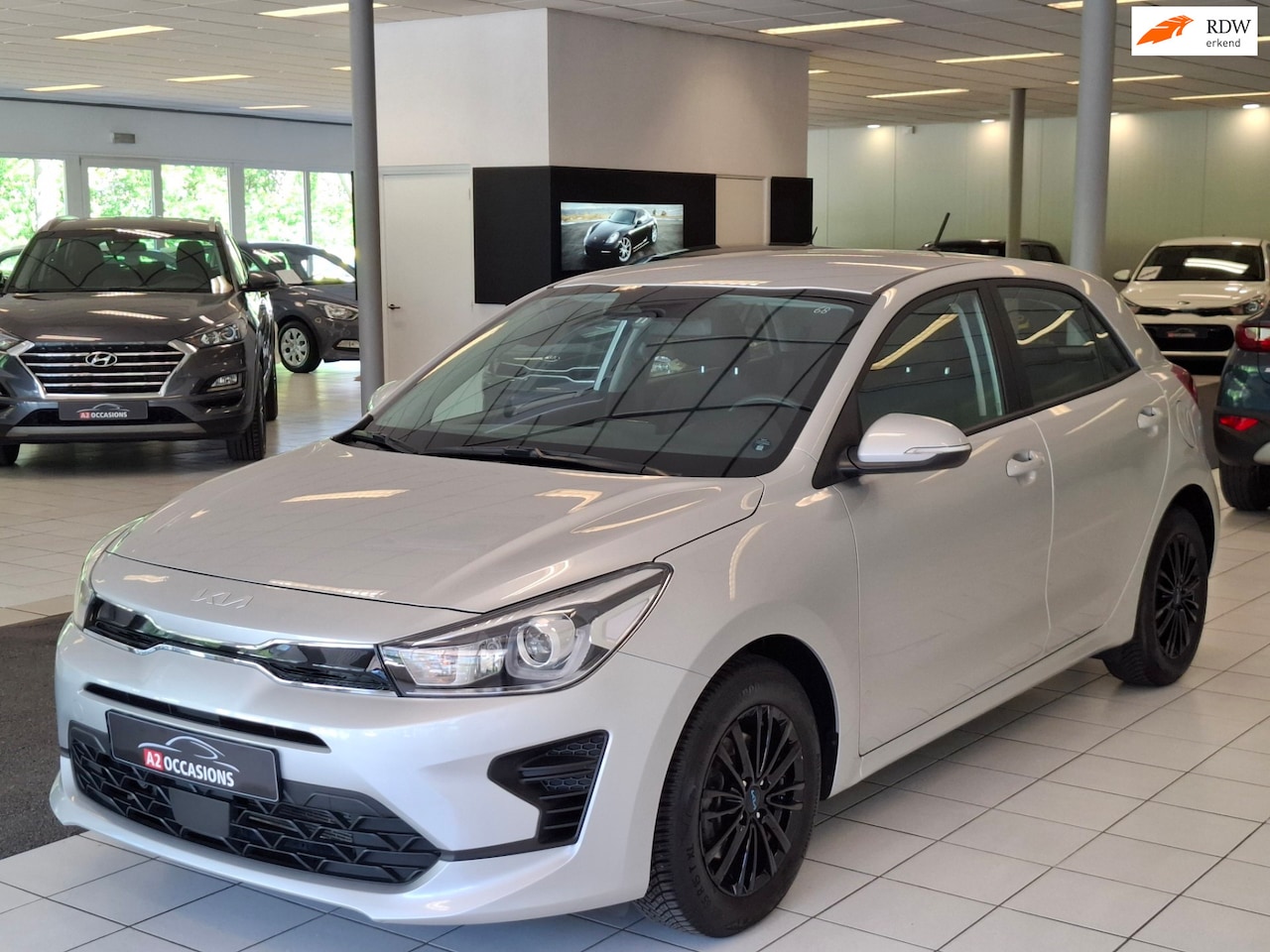 Kia Rio - 1.2 (4 Cil) Apple carplay/Android auto/Cruise/Camera/DAB/Bluetooth/Stoel en stuurverwarmin - AutoWereld.nl