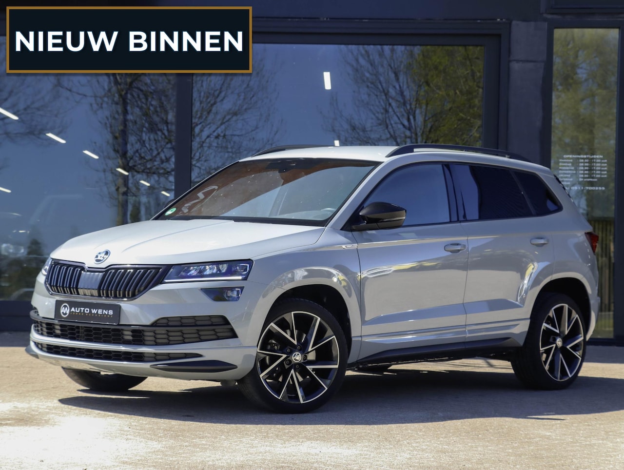 Skoda Karoq - 1.5 TSI ACT Sportline DSG Adapt. Cruise Trekhaak Winterpakket - AutoWereld.nl