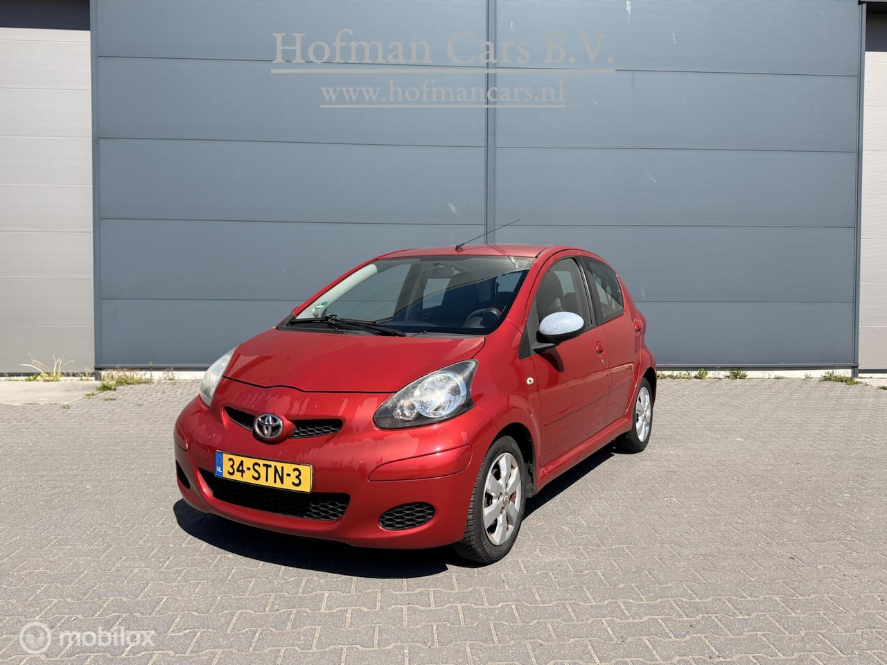 Toyota Aygo - 1.0-12V Aspiration Red Navigator 5-deurs Airco CV - AutoWereld.nl