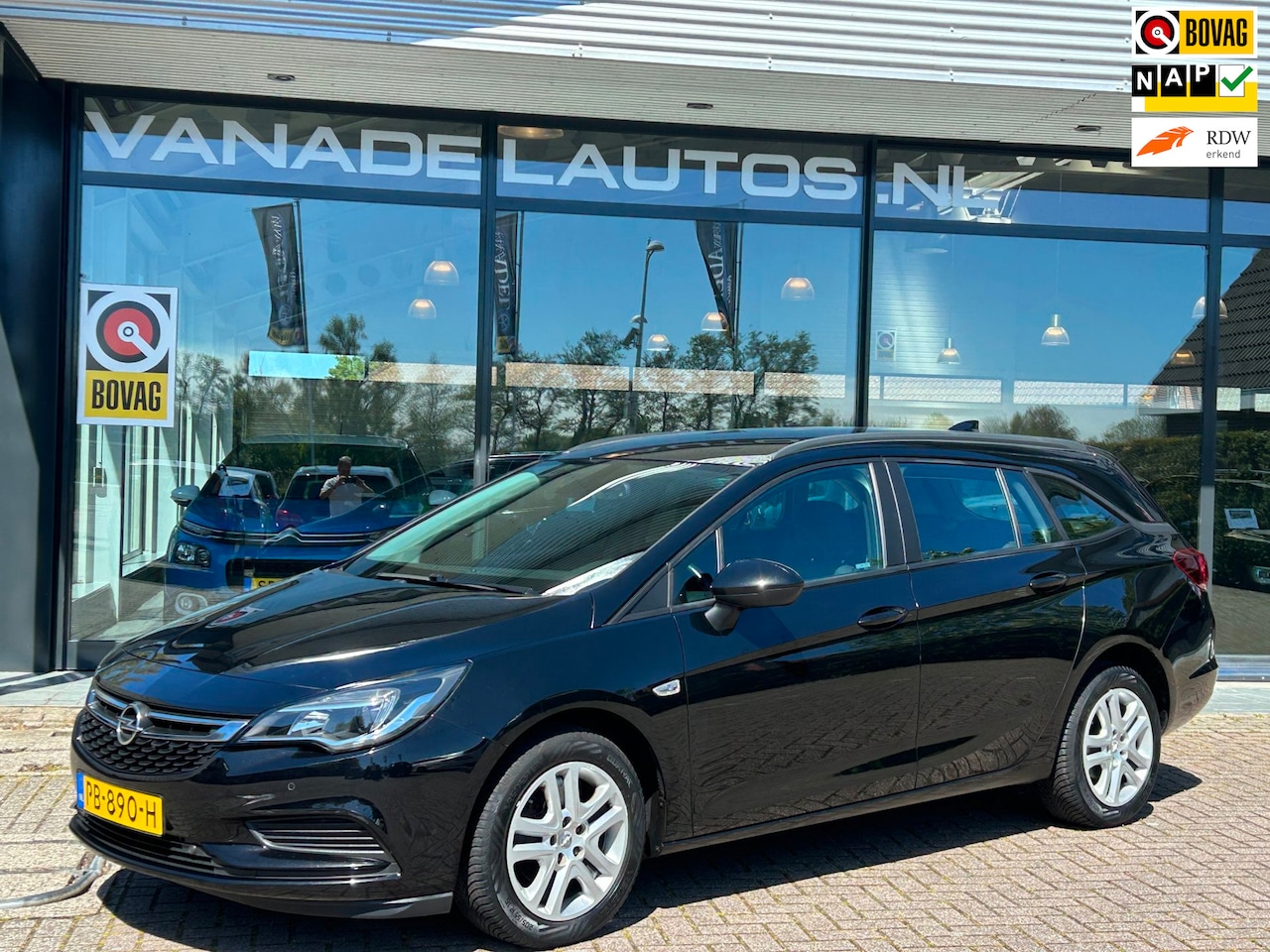 Opel Astra Sports Tourer - Online Edition Navi Camera Park.Sens NL-Auto NAP Dealeronderhouden! - AutoWereld.nl