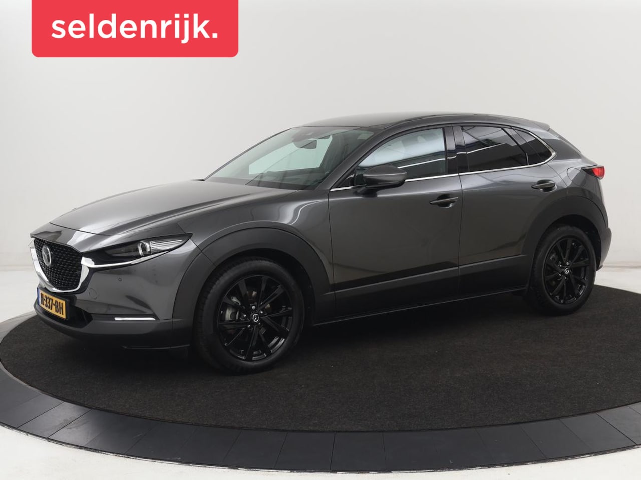 Mazda CX-30 - 2.0 e-SkyActiv-X M Hybrid Luxury | Leder | Trekhaak | Stoelverwarming | 360 Camera | Head- - AutoWereld.nl