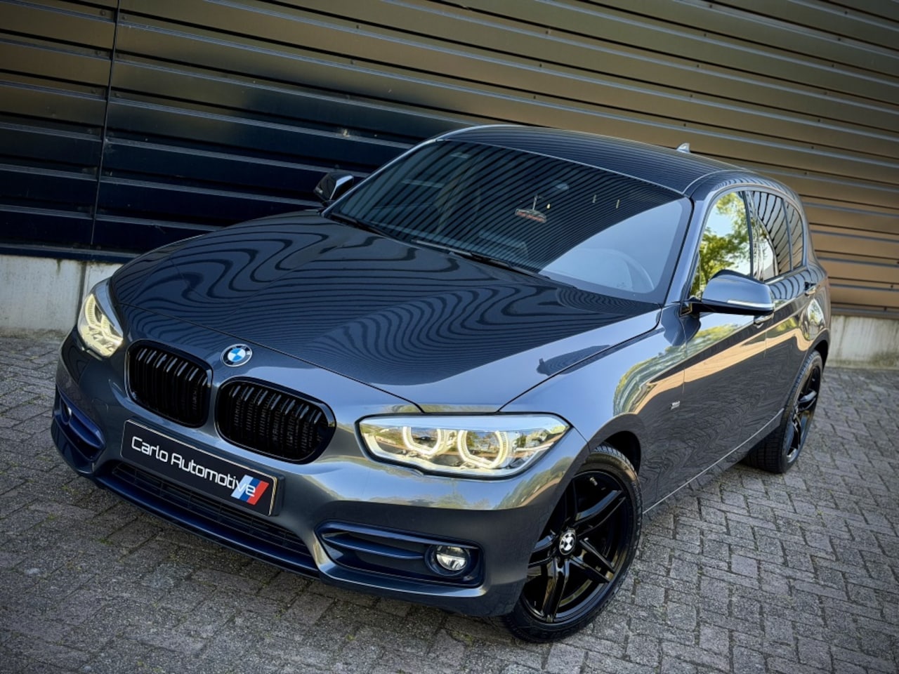 BMW 1-serie - 118i EXECUTIVE AUT|XENON|SPORTSTOEL|PDC|LED - AutoWereld.nl