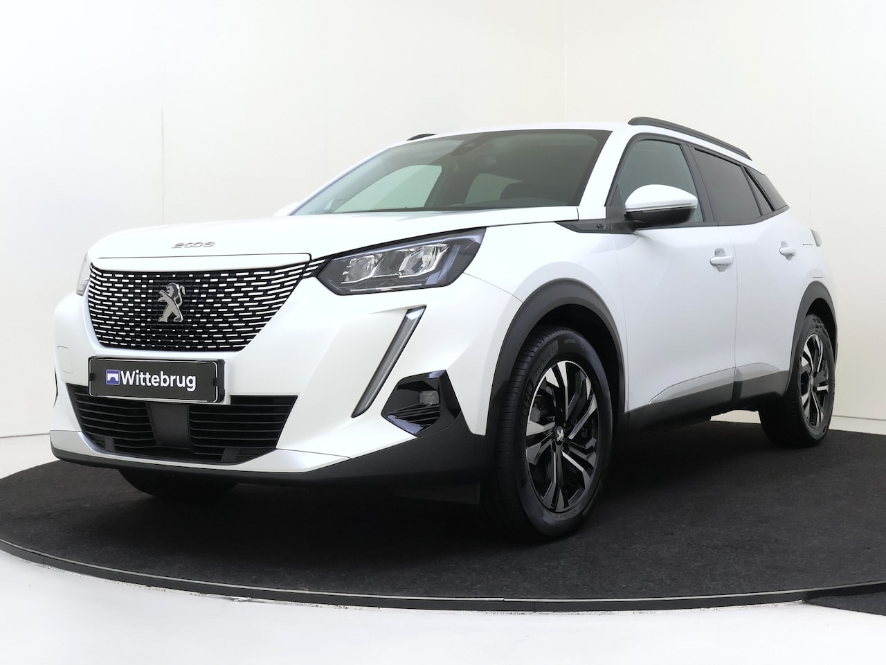 Peugeot e-2008 - EV Blue Lease Allure 50 kWh Clean 23-4 MA - AutoWereld.nl