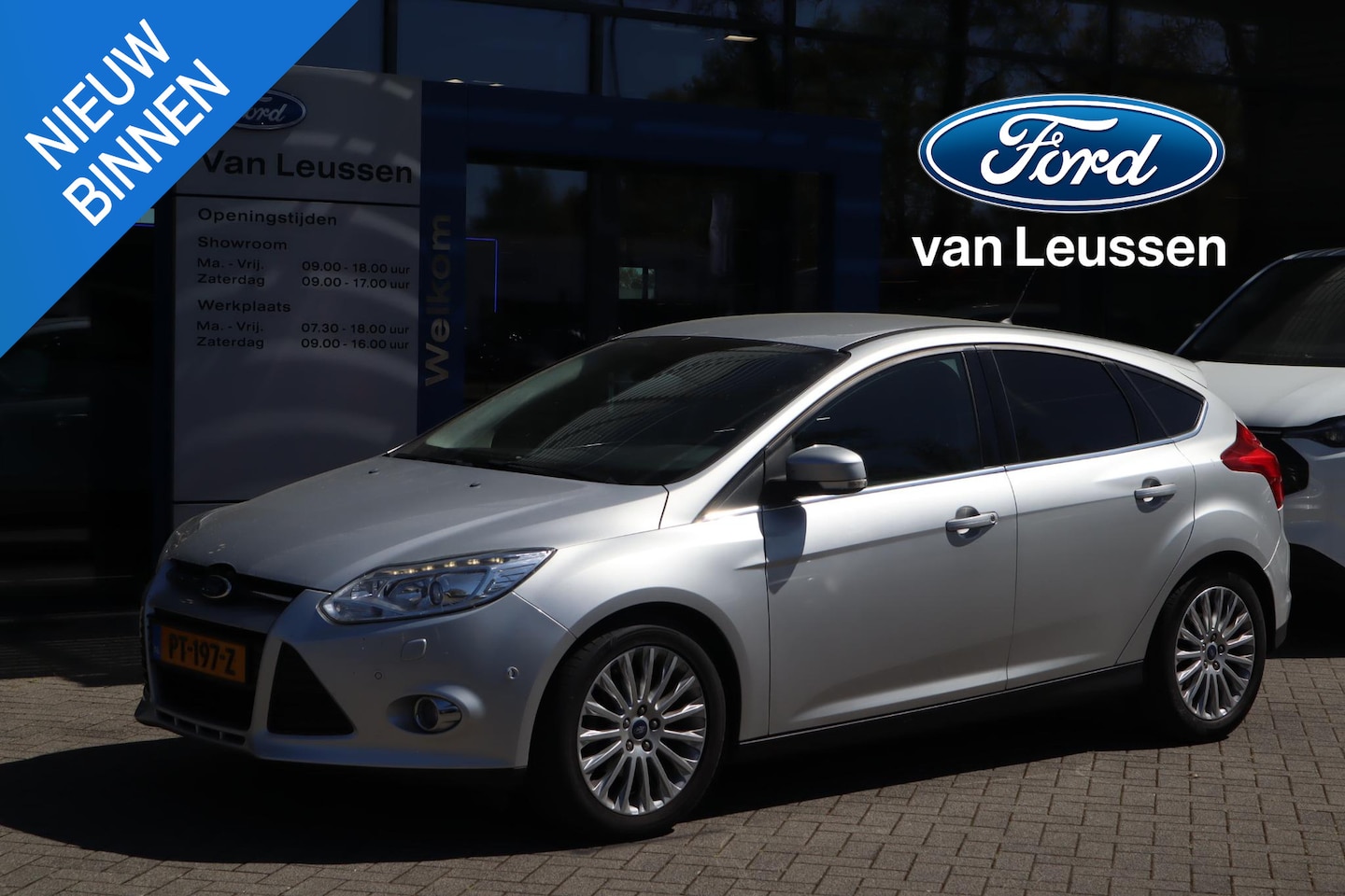 Ford Focus - 125PK TITANIUM 5-DEURS SONY-AUDIO AFN-TREKHAAK PARK-SENSOREN 17"LM-VELGEN PRIVACY-GLASS CL - AutoWereld.nl