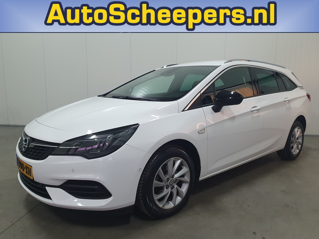 Opel Astra Sports Tourer - 1.2 Elegance PDC/NAVI/CARPLAY/LED/TRHAAK/CRUISE - AutoWereld.nl