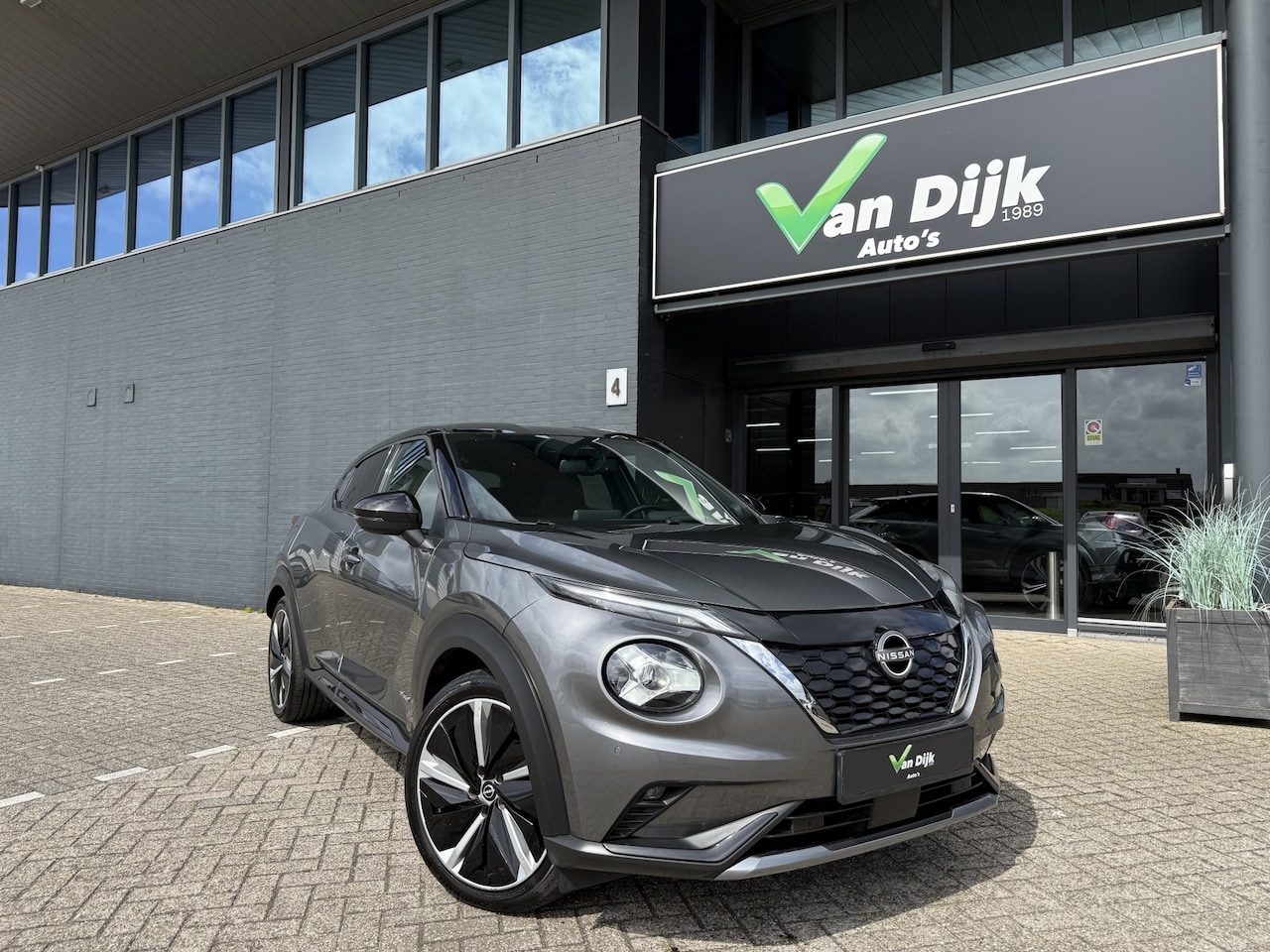 Nissan Juke - 1.6 Hybrid N-Design Navi Camera 1/2 Leer Keyless - AutoWereld.nl
