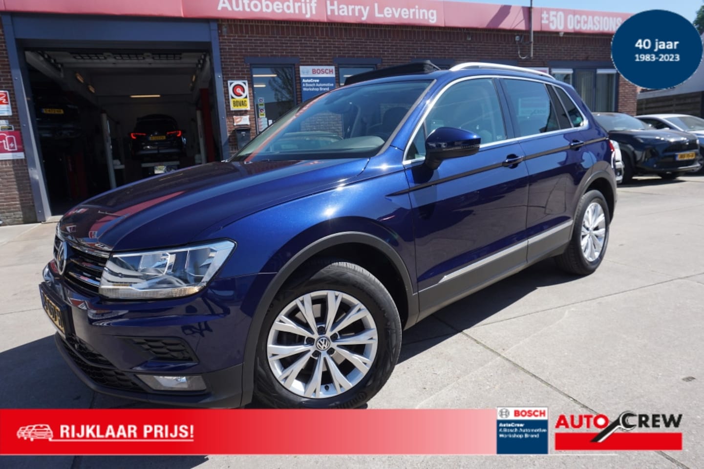 Volkswagen Tiguan - 1.4 TSI ACT 150pk Comfortline Business Panoramadak Navigatie Afn.trekhaak - AutoWereld.nl