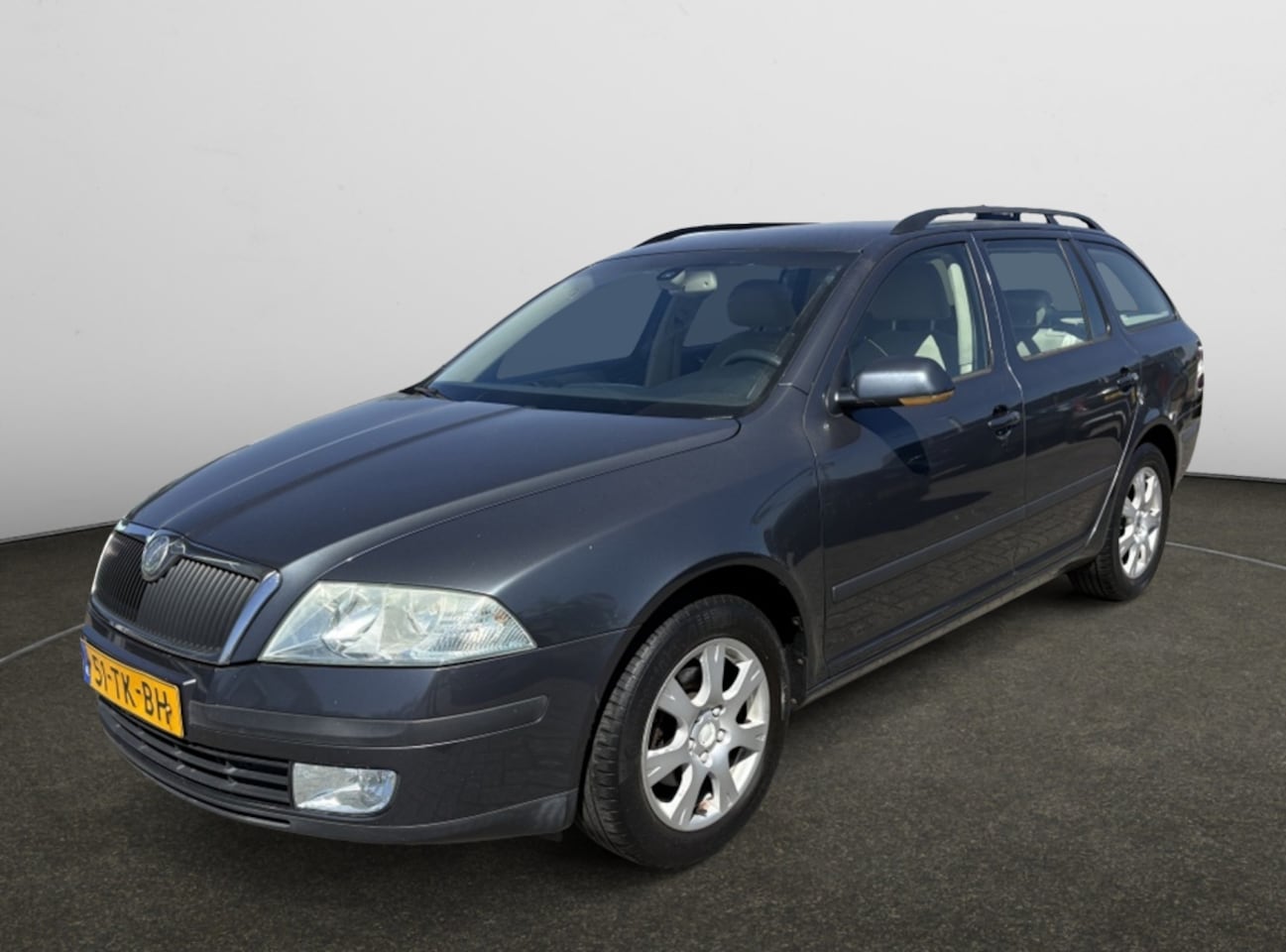Skoda Octavia Combi - 1.6 Elegance 1.6 Elegance - AutoWereld.nl