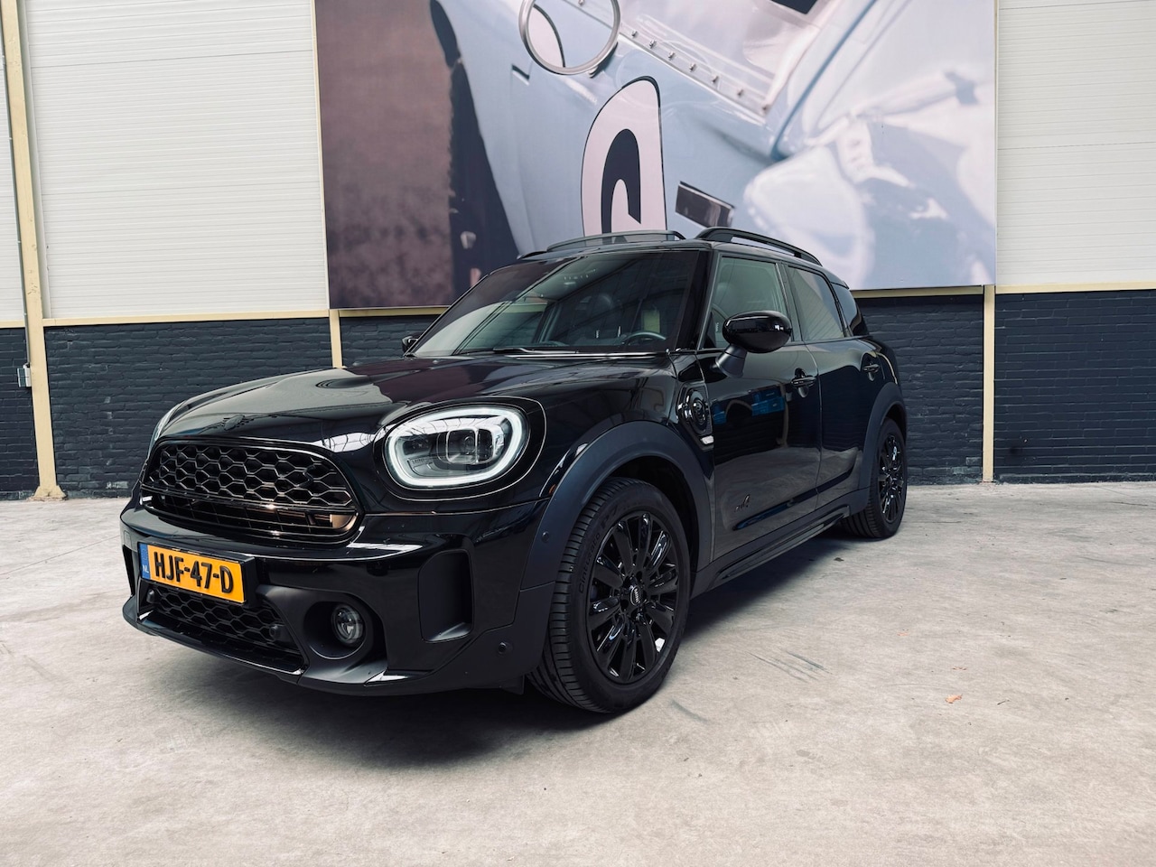MINI Countryman - Mini 1.5 Cooper S E ALL4 ALL4|ALL BLACK|PANO|H&K|LEDER|VOL VOL| - AutoWereld.nl