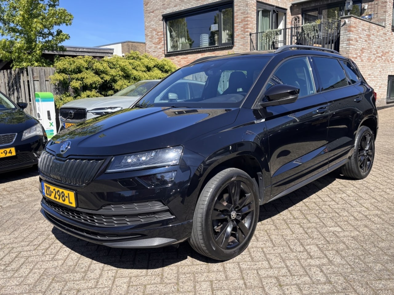 Skoda Karoq - 1.5 TSI Sportline Bussines / sportstielen / Dodehoek / - AutoWereld.nl