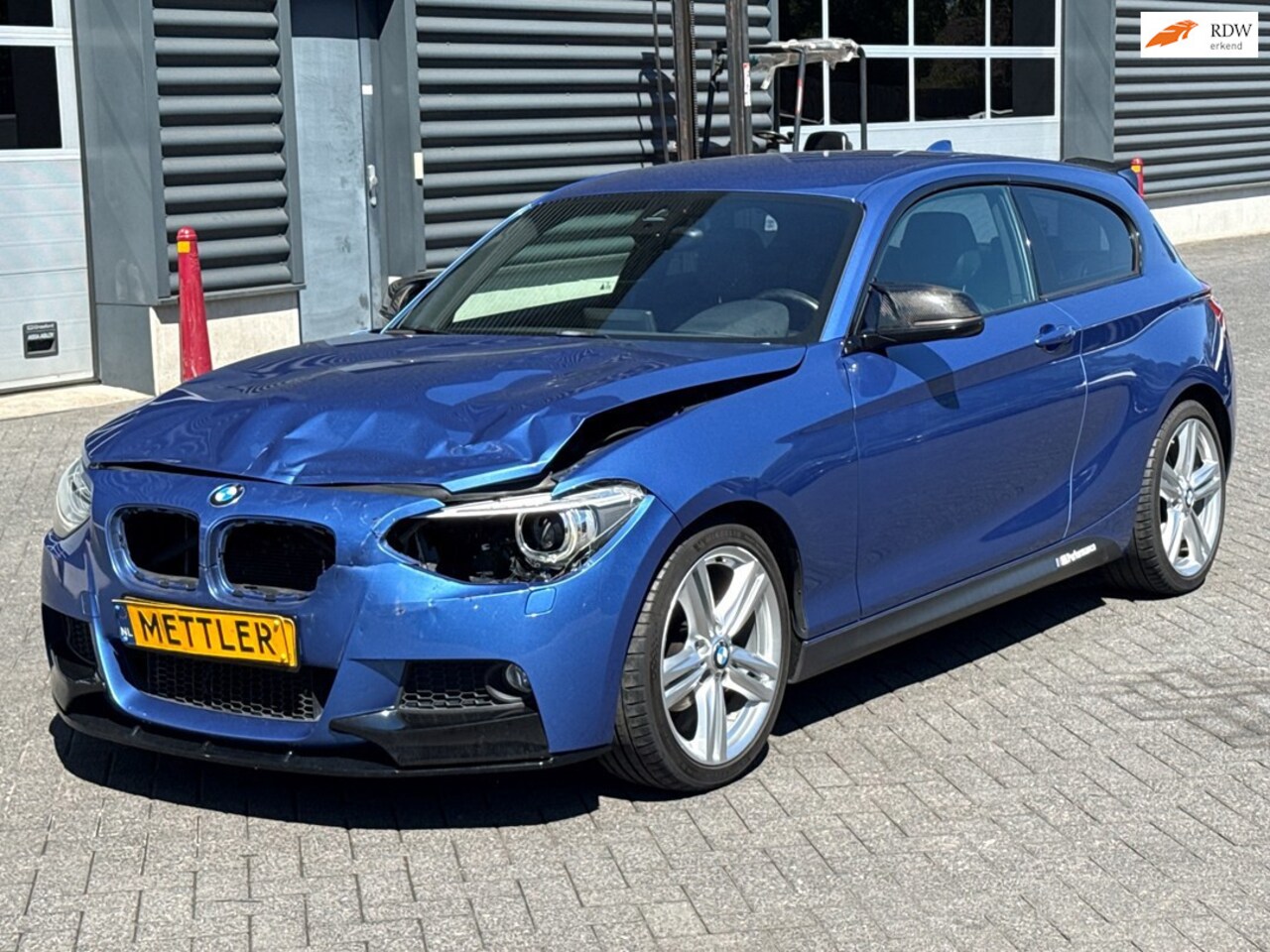 BMW 1-serie - 114i Upgrade Edition 114i Upgrade Edition, M Sport, airco, cruise control, stoelverwarming - AutoWereld.nl