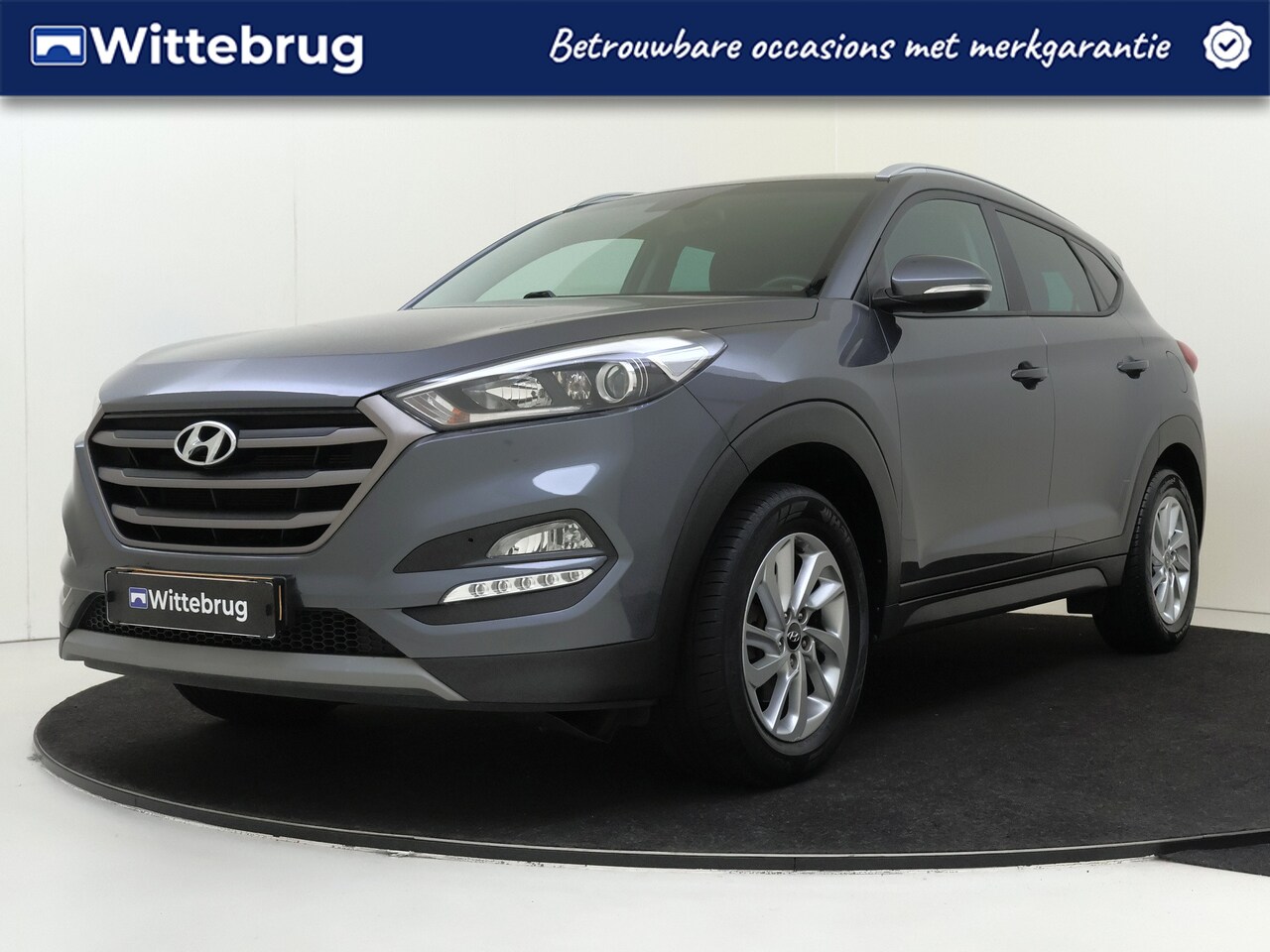 Hyundai Tucson - 1.6 GDi Comfort NAVIGATIE | CLIMATE CONTROL | RUIME AUTO MET HOGE ZIT! CC - AutoWereld.nl