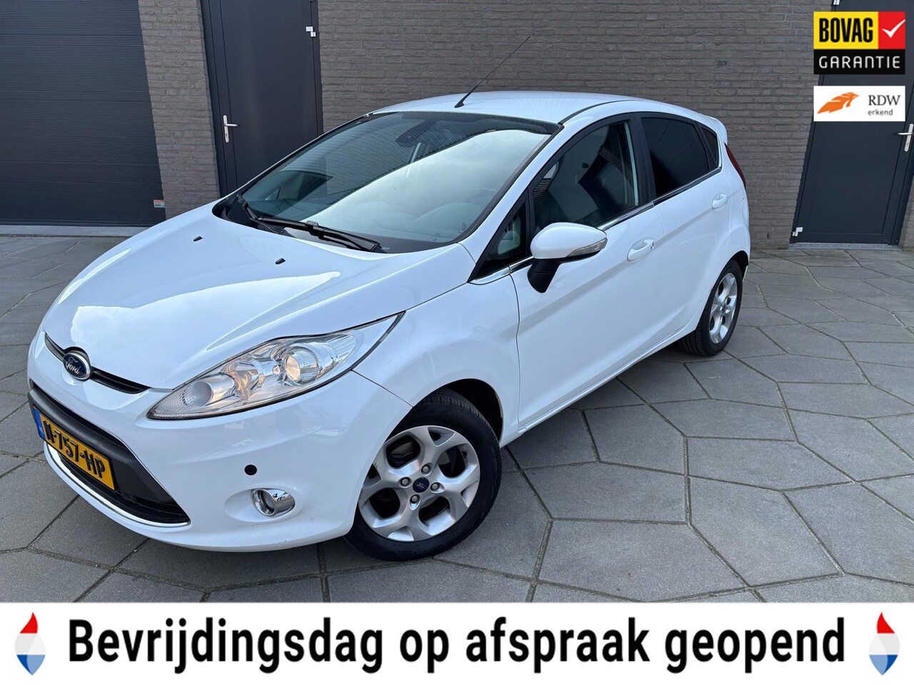 Ford Fiesta - 1.25 Ghia 1.25 Ghia - AutoWereld.nl