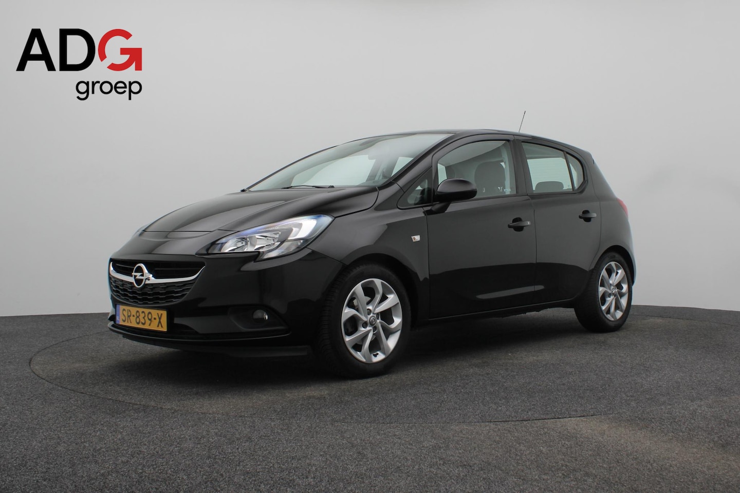 Opel Corsa - 1.4 Online Edition BOVAG Garantie | Airco | Cruise Control | Nette auto - AutoWereld.nl
