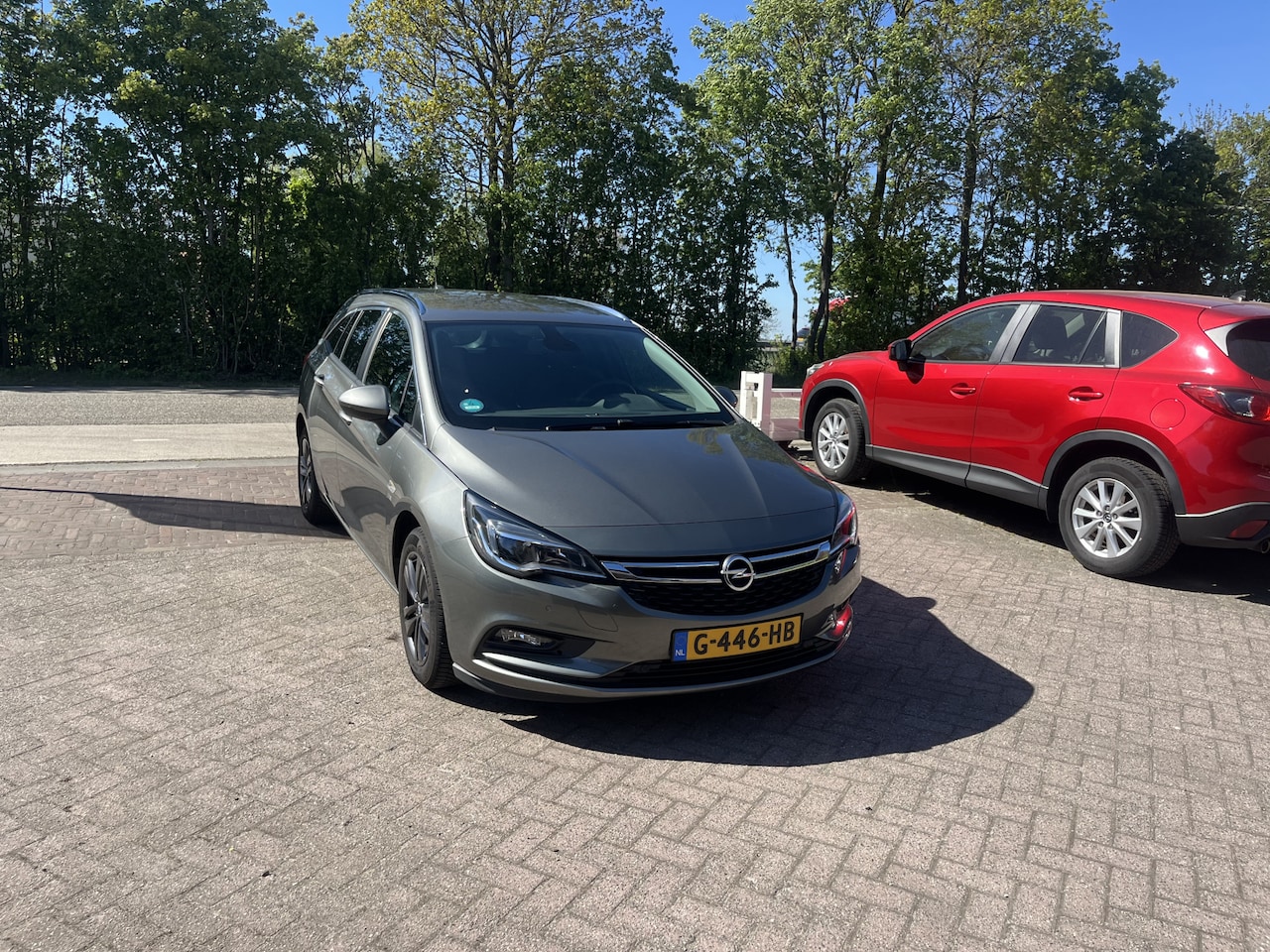 Opel Astra Sports Tourer - 1.0 Turbo 120 Jaar Edition TREKHAAK NAVI CARPLAY - AutoWereld.nl