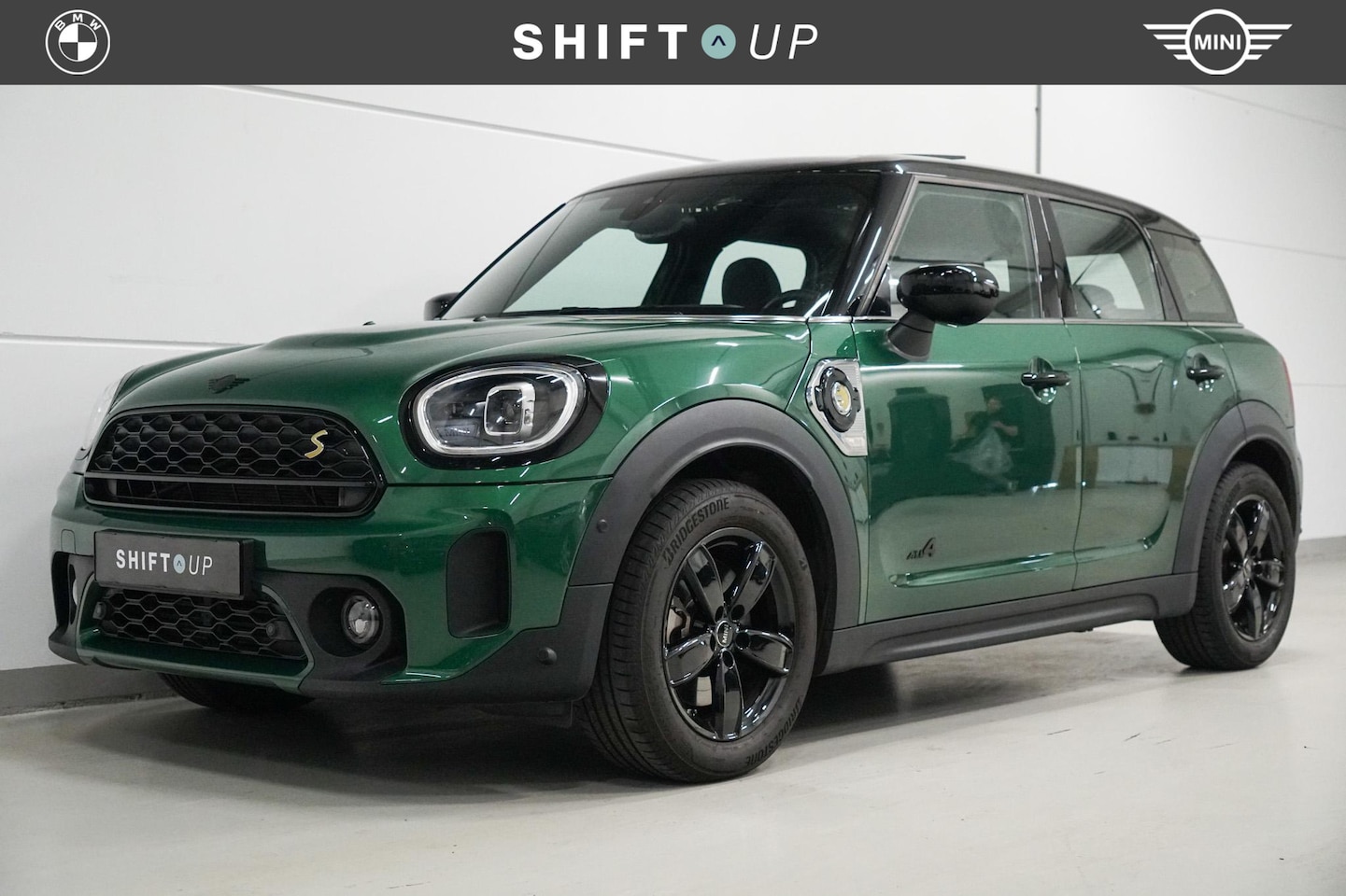 MINI Countryman - Mini 1.5 Cooper S E ALL4 Panoramadak | Harman Kardon | Head Up | Acc - AutoWereld.nl