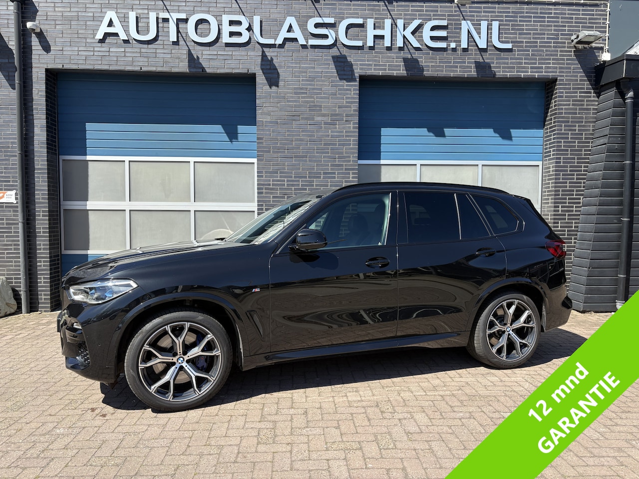 BMW X5 - xDrive40i High Executive xDrive40i High Executive, M pakket, panodak, 21 inch, 4 nieuwe banden, trekhaak - AutoWereld.nl