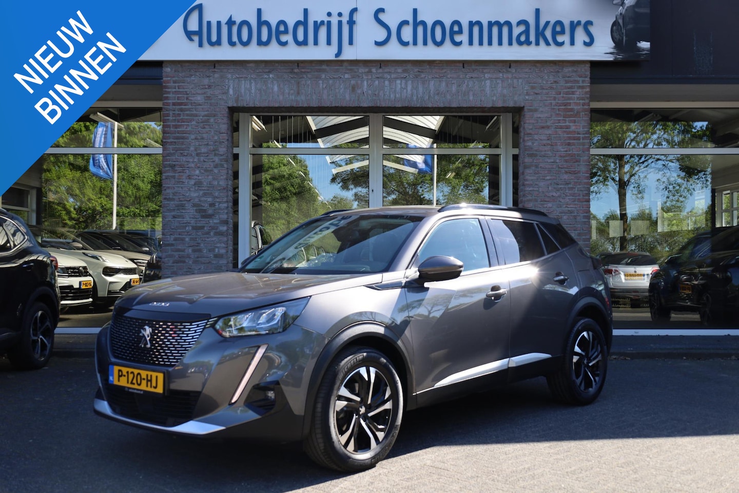 Peugeot 2008 - 1.2 PureTech Allure Pack CAMERA HALFLEER DAB CARPLAY LED 17"LMV ENZ. - AutoWereld.nl
