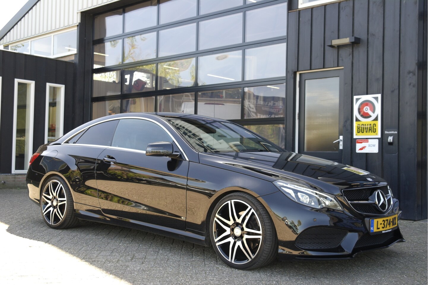 Mercedes-Benz E-klasse Coupé - 200 Prestige Sport Edition | Leder | Camera | Cruise | LED | 19'' - AutoWereld.nl