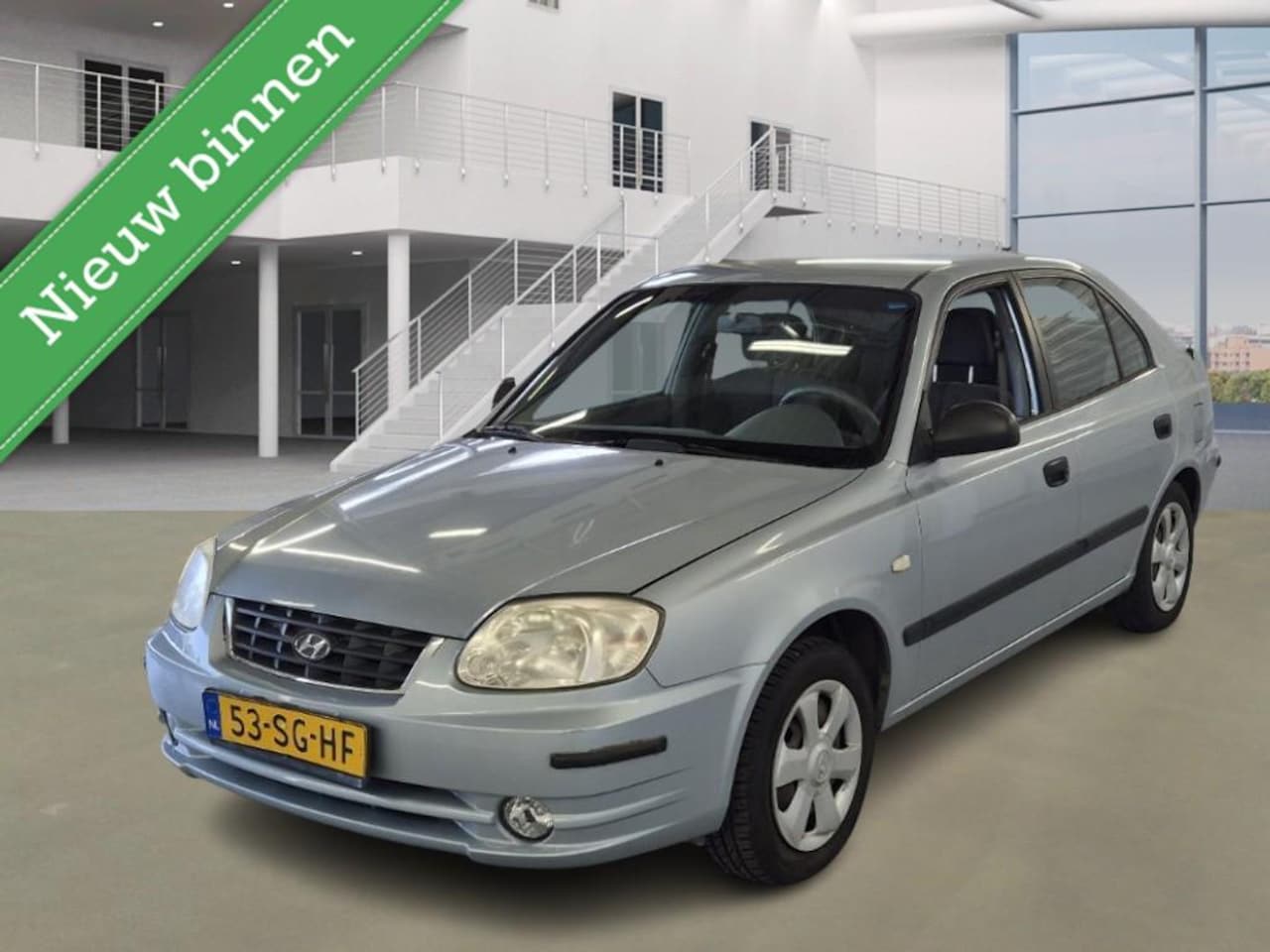 Hyundai Accent - 1.3i Active Young | AIRCO | TREKHAAK - AutoWereld.nl