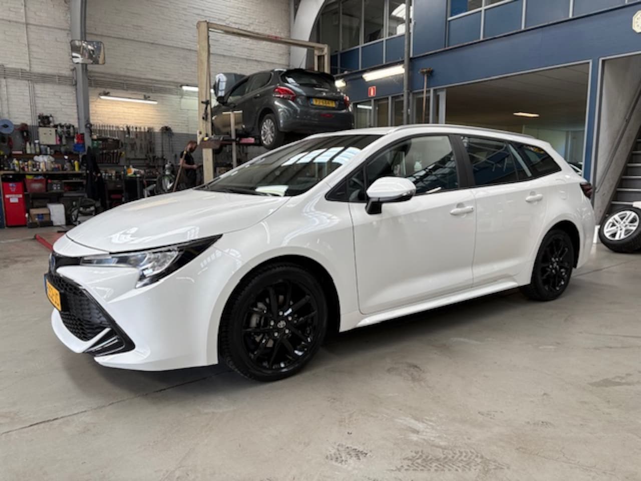 Toyota Corolla Touring Sports - 1.8 Hybrid 122pk CVT Business - AutoWereld.nl