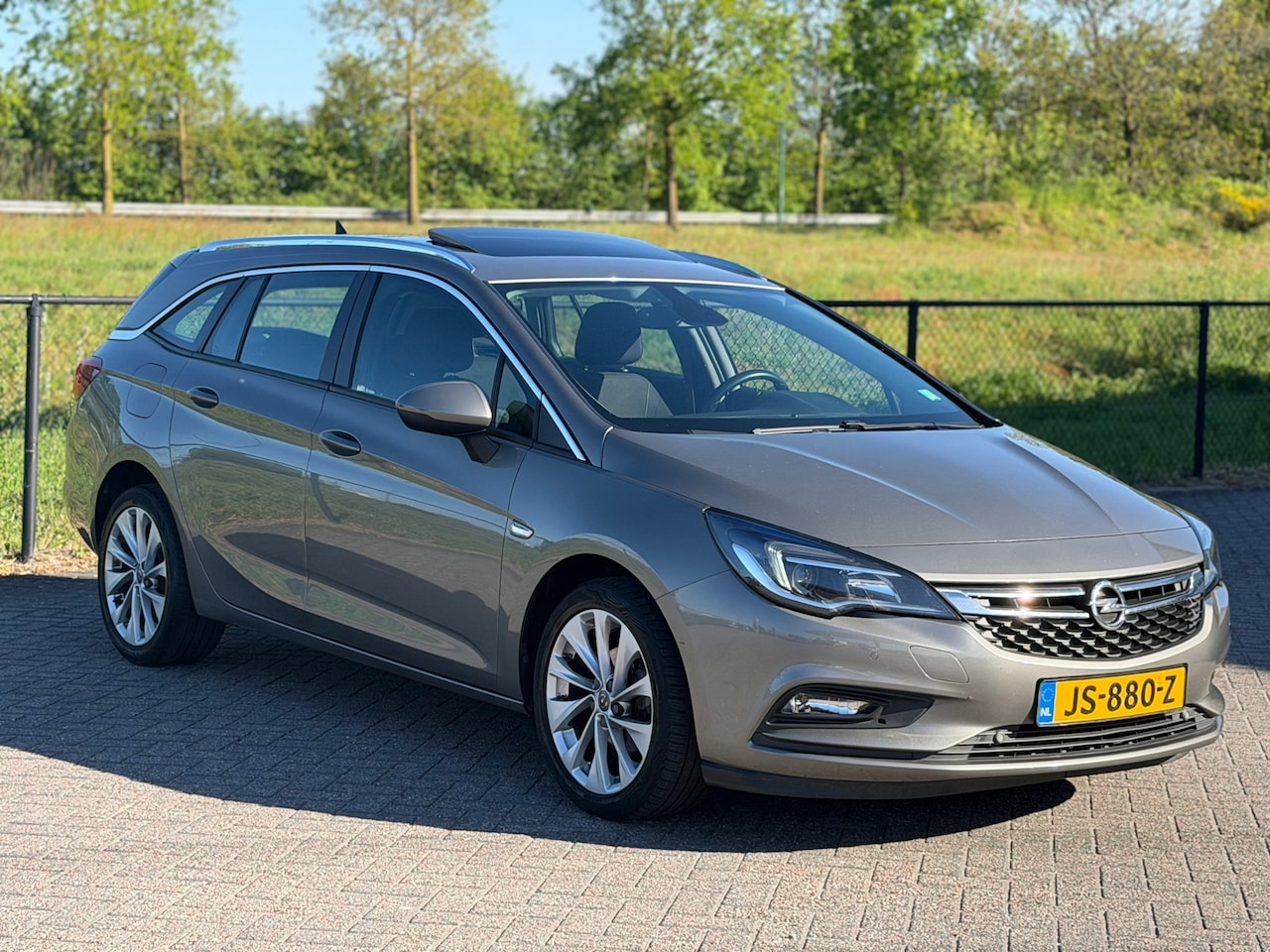 Opel Astra Sports Tourer - 1.0 Edition+CARPLAY+SCHUIDAK+AIRCO+CRUISE+NAP - AutoWereld.nl
