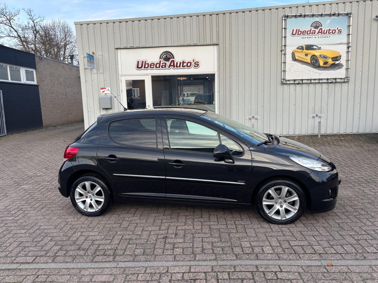 Peugeot 207 - 1.4 VTi Sportium NL AUTO KM 133225 NAP 5 DEURS 3750e - AutoWereld.nl