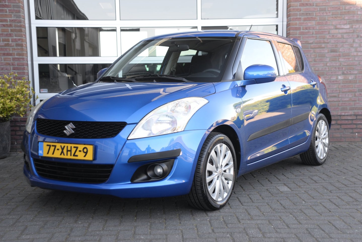 Suzuki Swift - 1.2 Exclusive EASSS | Stoelverwarming | Orig. NL | Clima Airco | - AutoWereld.nl