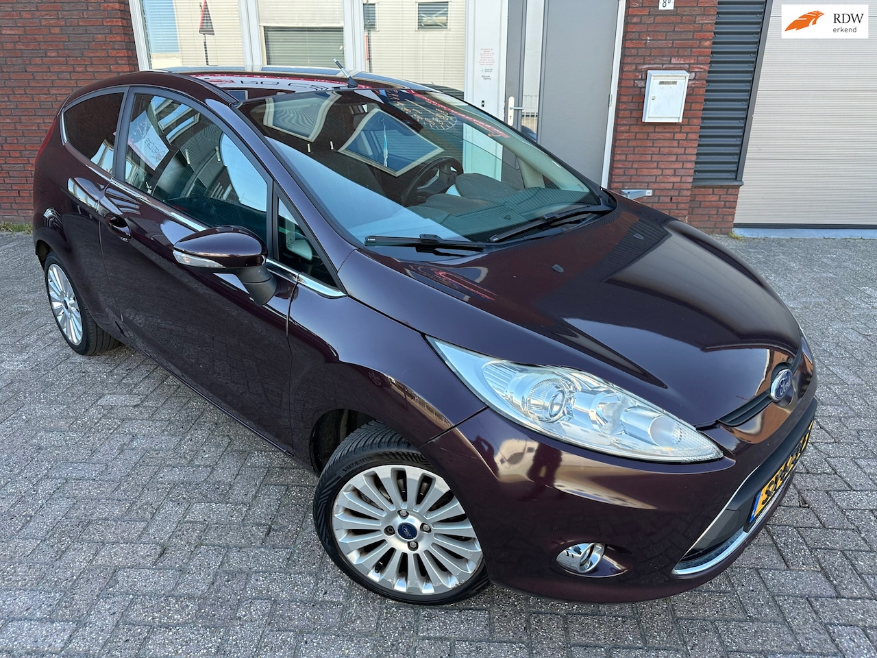 Ford Fiesta - 1.4 Titanium / Airco / Cruise / LM - AutoWereld.nl