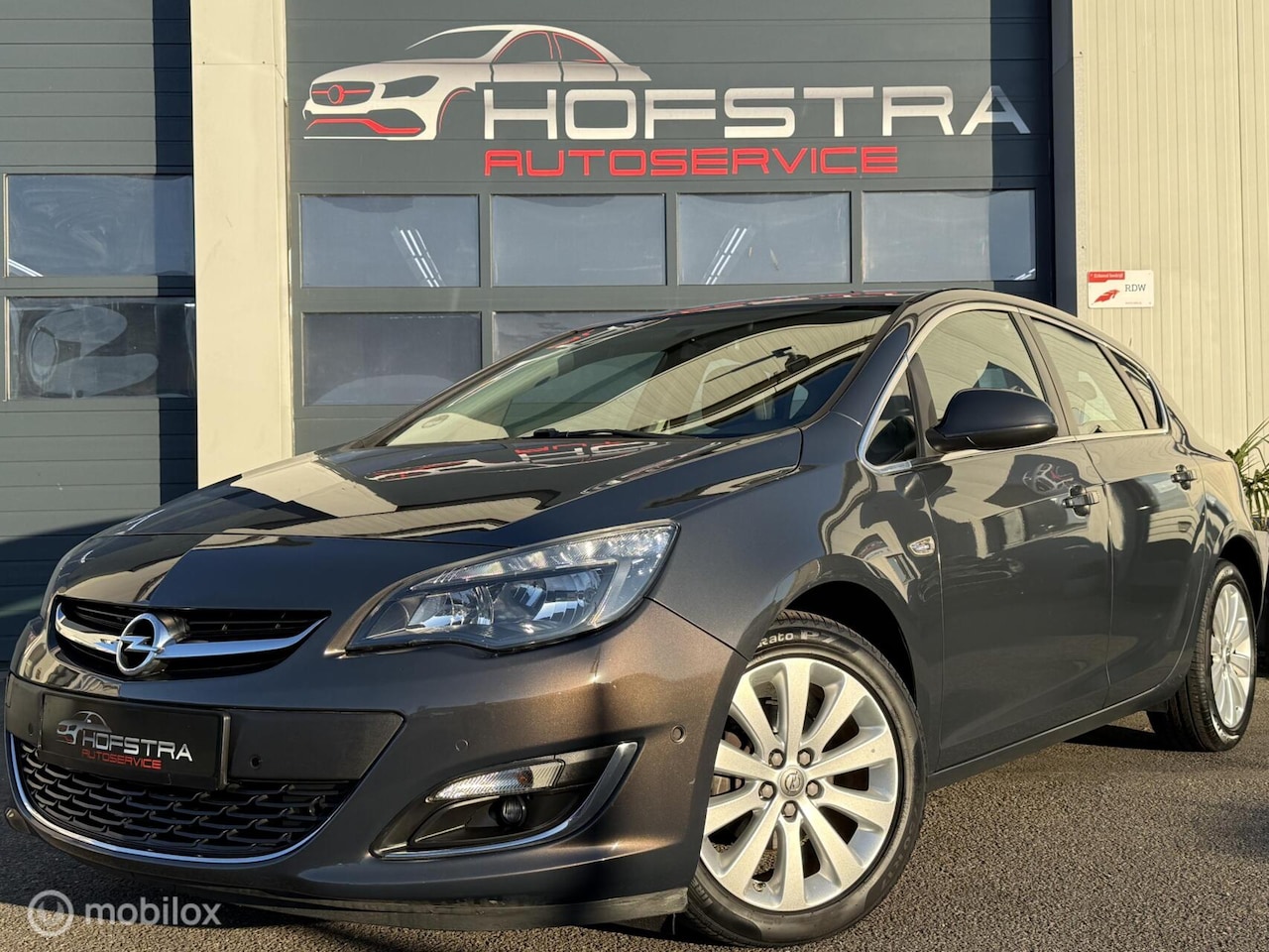 Opel Astra - 1.4 Turbo Sport + Automaat Navi Clima Cruise Sfeerverl - AutoWereld.nl