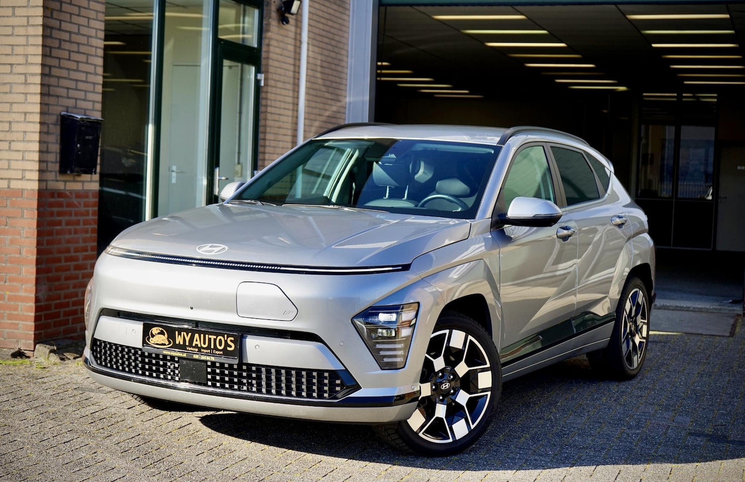 Hyundai Kona Electric - Premium 65.4 kWh FullOptions|Warmtepomp|Leder|HUD|BOSE|Garantie2029 - AutoWereld.nl