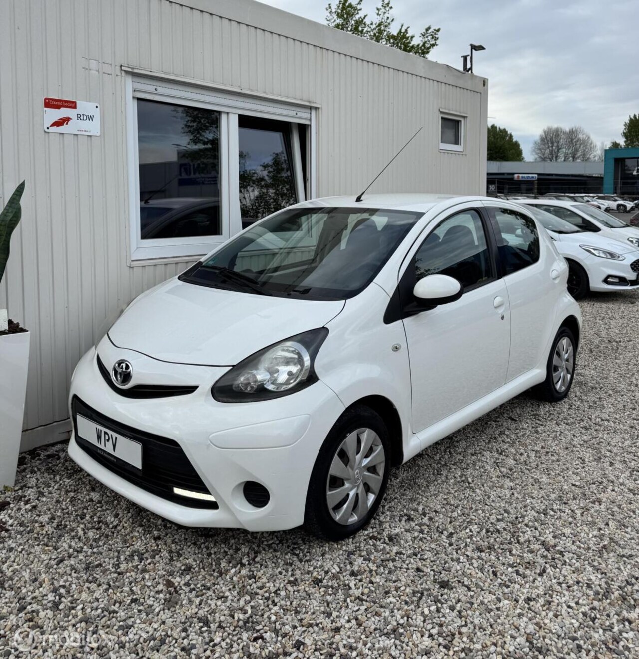 Toyota Aygo - 1.0 VVT-i Aspiration Airco Navigatie New APK - AutoWereld.nl